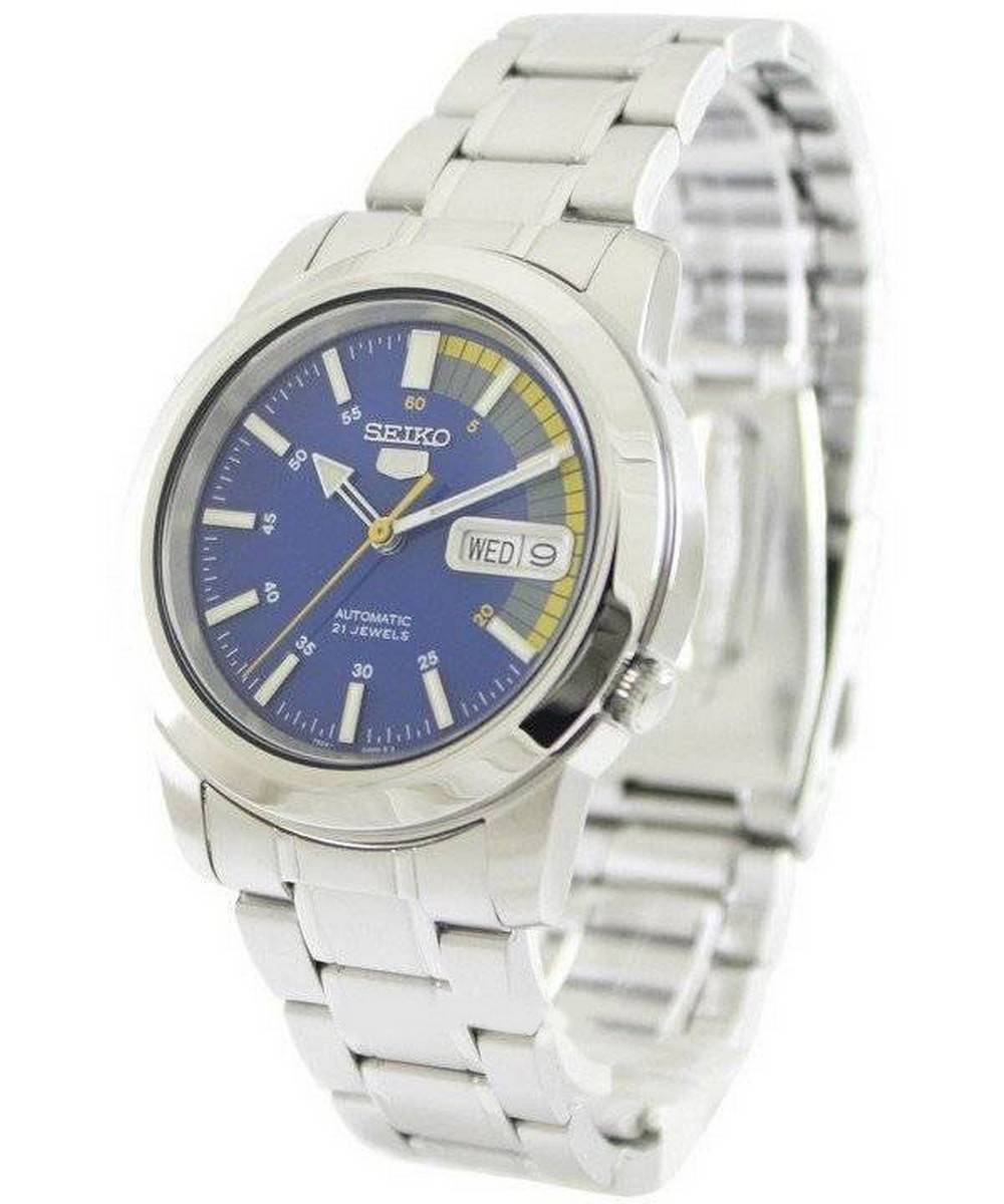 Seiko 5 Automatic 21 Jewels SNKK27 SNKK27K Water Resistant. A brand-new Seiko watch featuring a Stainless steel strap. Angled view.