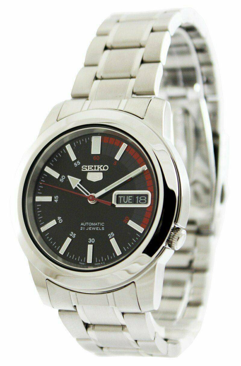 Seiko 5 Automatic 21 Jewels SNKK31 SNKK31K Water Resistant. A brand-new Seiko watch featuring a Stainless steel strap. Side view.
