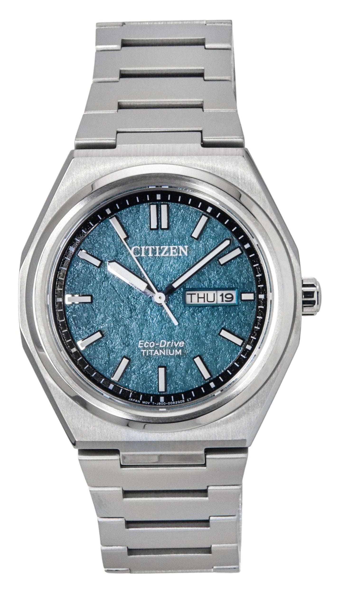 Citizen Eco-Drive Date display Green Titanium Male AW0130-85X. A brand-new Citizen Eco-Drive watch featuring a Green dial and a Titanium strap. Angled view.