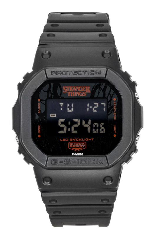 Casio G-Shock Quartz movement Black Plastic Male DW-5600STT-1. A brand-new Casio G-Shock watch featuring a Black dial and a Plastic strap. Angled view.