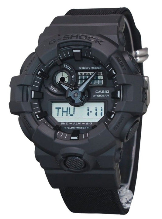 Casio G-Shock Quartz movement Black Polyester Male GA-700BCE-1A. A brand-new Casio G-Shock watch featuring a Black dial and a Polyester strap. Angled view.
