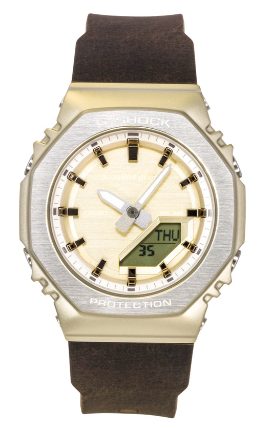 Casio G-Shock Quartz movement Gold Plastic Male GM-S2110BP-5A. A brand-new Casio G-Shock watch featuring a Gold dial and a Plastic strap. Front view.