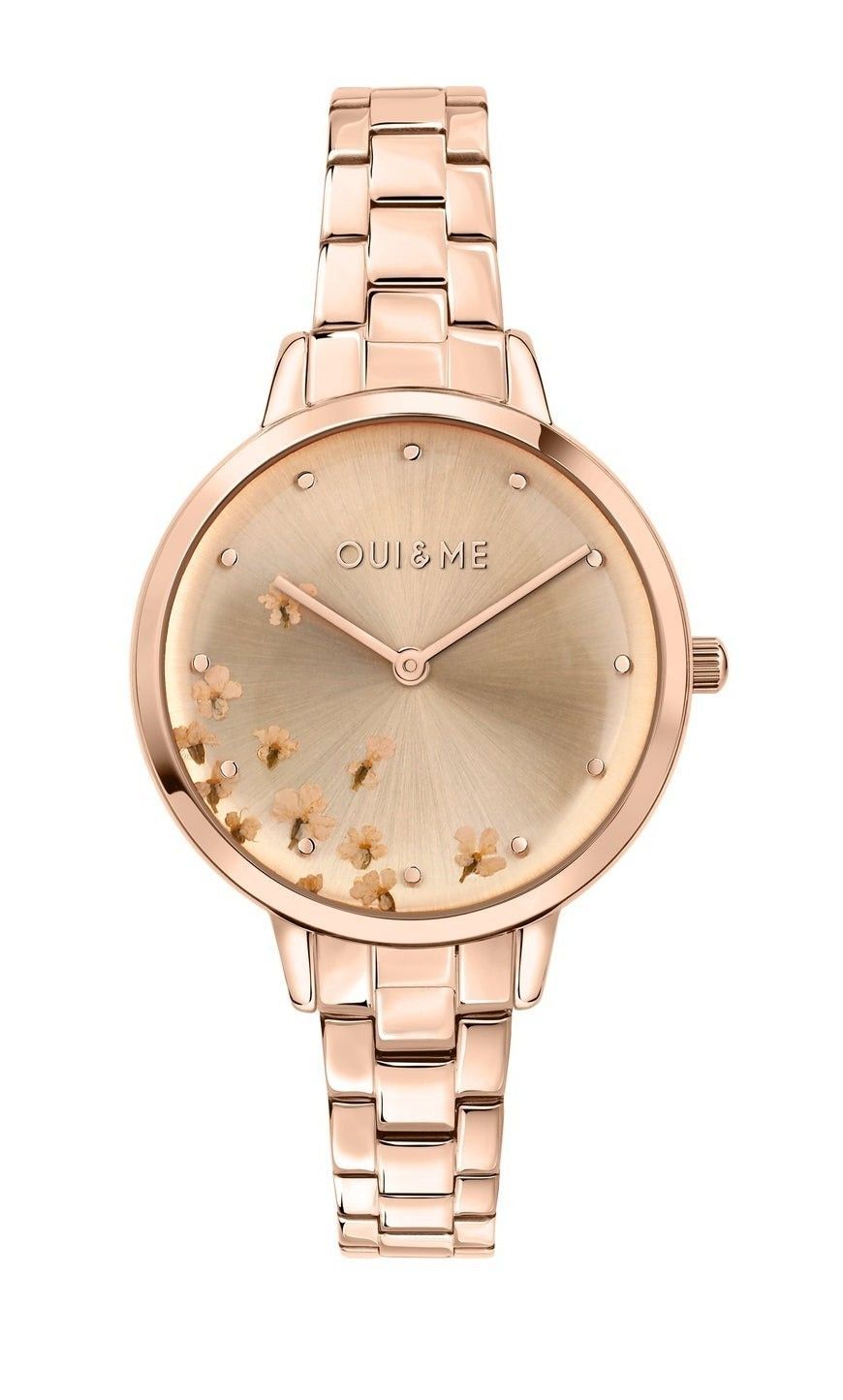 Oui & Me Fleurette Quartz movement Gold Stainless steel Female ME010370-. A brand-new Oui & Me Fleurette watch featuring a Gold dial and a Stainless steel strap. Angled view.