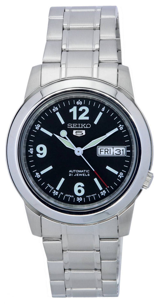 Seiko Automatic movement Black Stainless steel Male SNKE63J1. A brand-new Seiko watch featuring a Black dial and a Stainless steel strap. Front view.