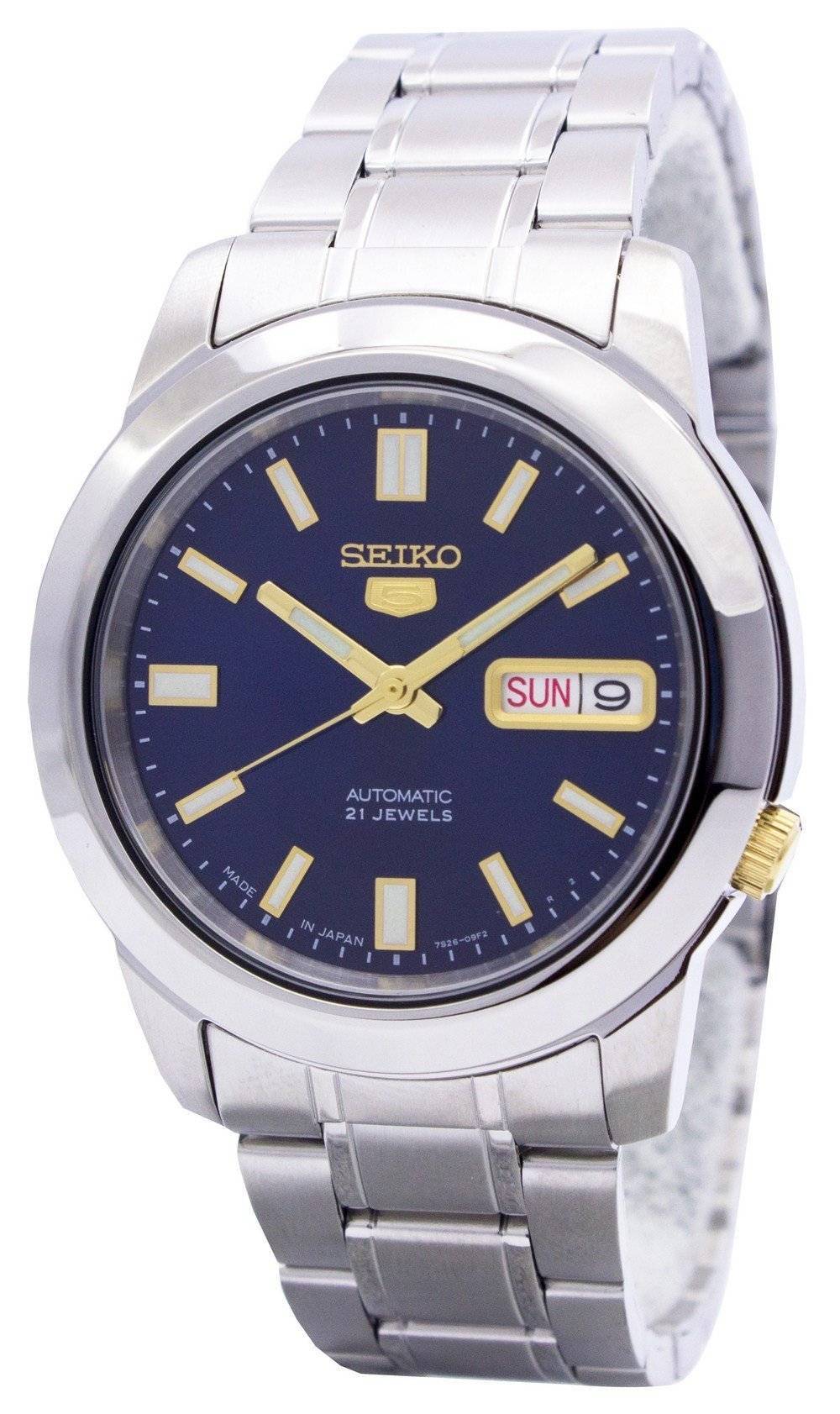 Seiko Automatic movement Black Stainless steel Male SNKK11J1. A brand-new Seiko watch featuring a Black dial and a Stainless steel strap. Angled view.