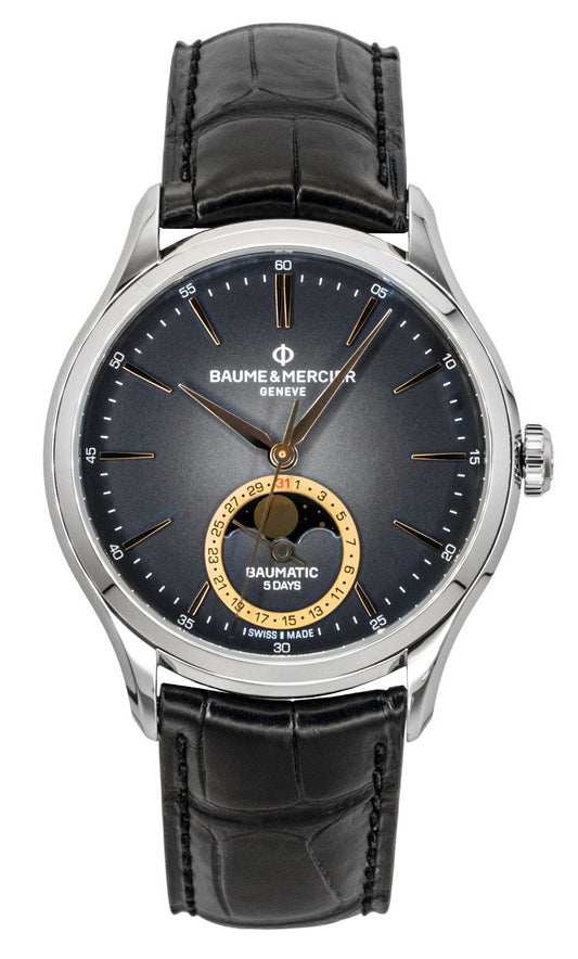 Baume & Mercier Clifton Leather Strap Moon phase Black Dial. A brand-new Baume & Mercier watch featuring a Black dial and a Leather strap. Angled view.