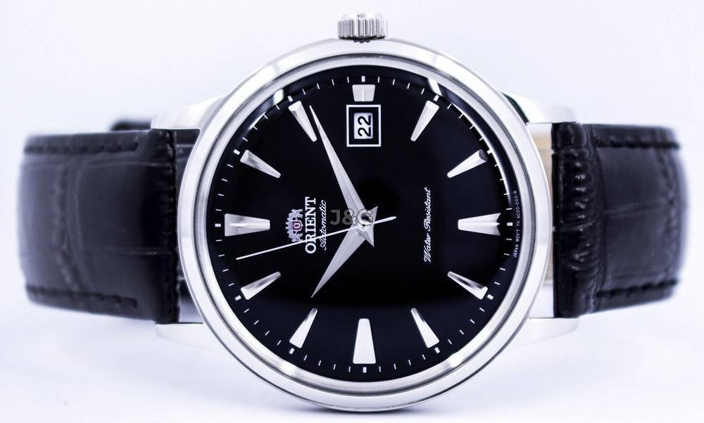 Orient Bambino Automatic movement Black Leather Male FAC00004B0. A brand-new Orient Bambino watch featuring a Black dial and a Leather strap. Angled view. - view 4