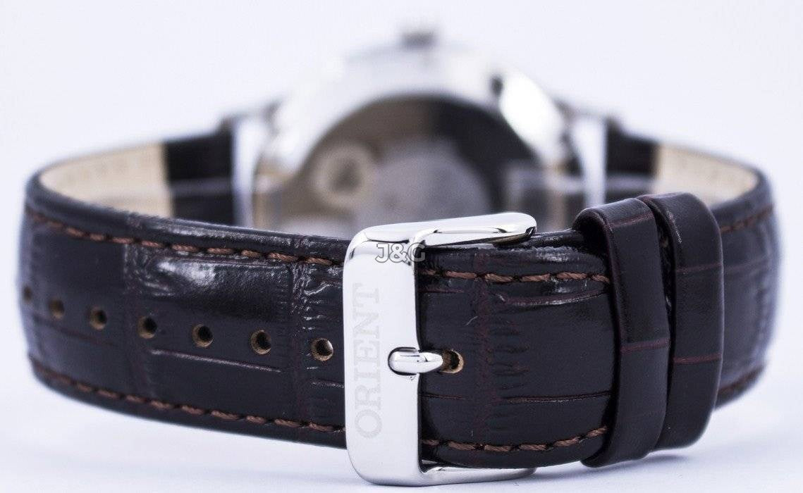 Orient Bambino Automatic movement White Leather Male FAC00005W0. A brand-new Orient Bambino watch featuring a White dial and a Leather strap. Angled view. - view 5