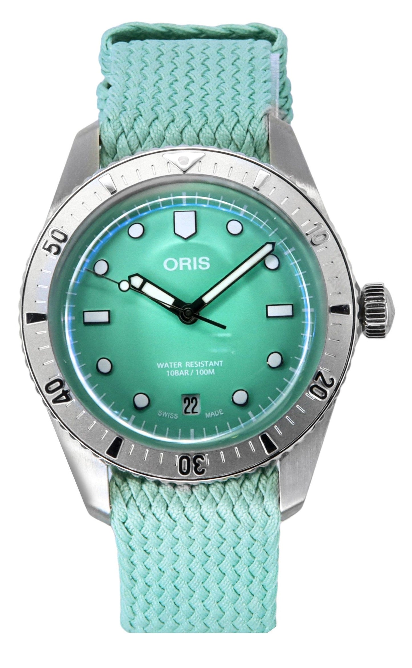 Oris Divers Sixty-Five Cotton Candy Mint Green Dial. A brand-new Oris Divers Sixty-Five watch featuring a Green dial and a Polyester strap. Side view.