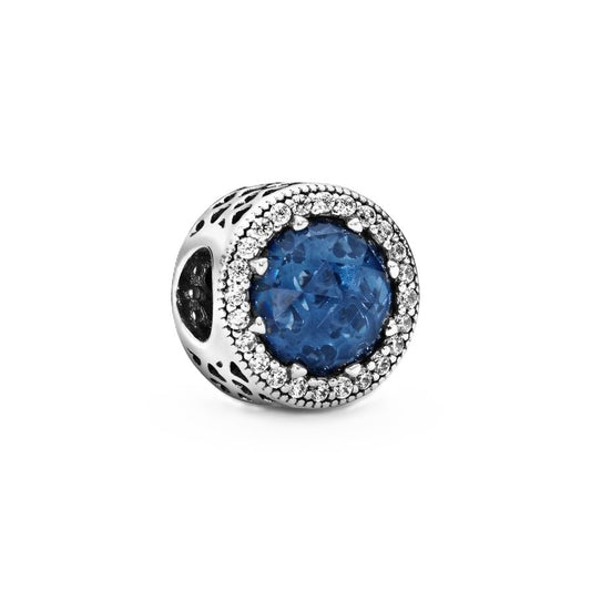 Pandora Radiant Hearts Charm With Blue Crystal And Clear. A brand-new PANDORA watch. Angled view.