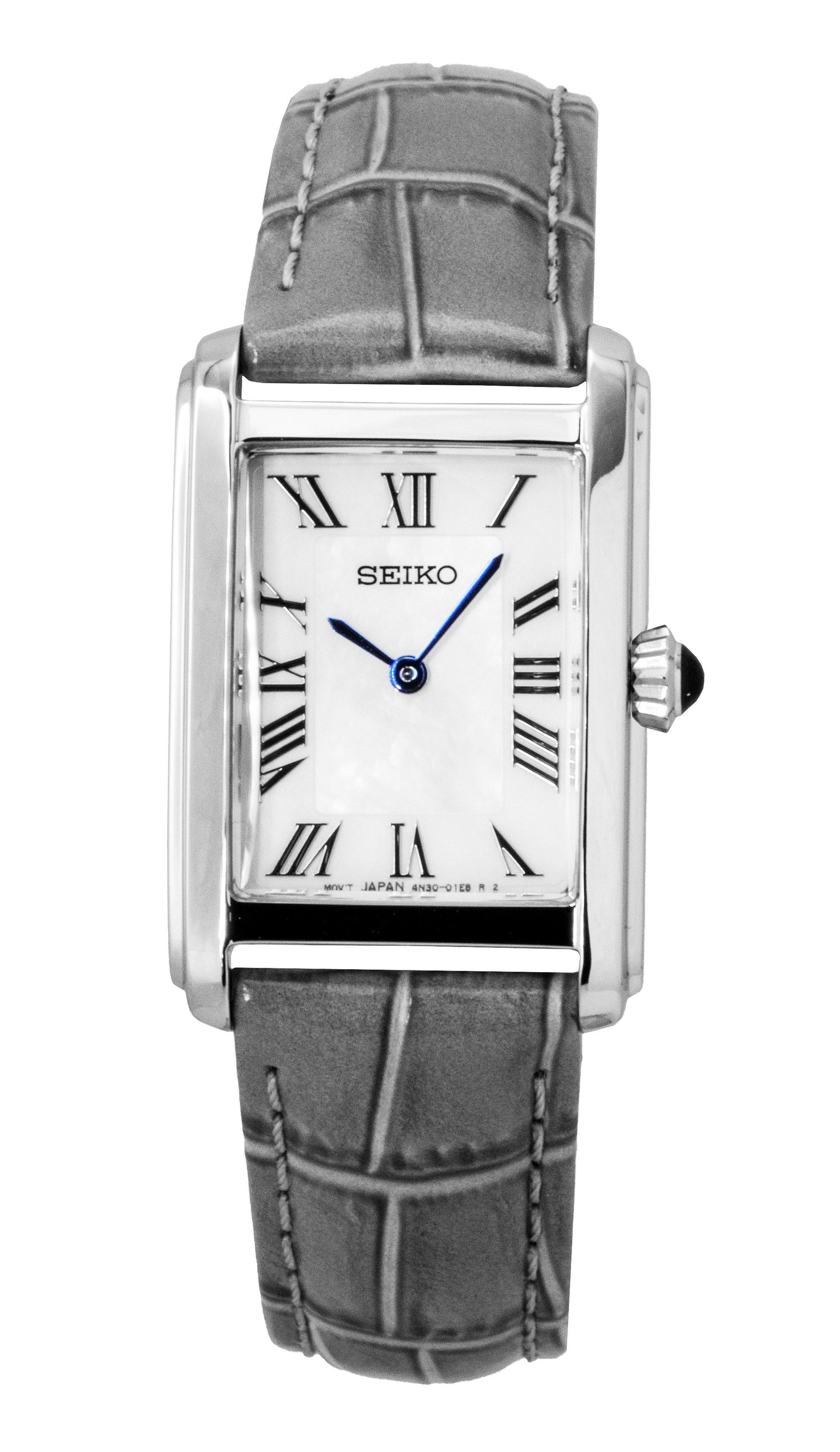 Seiko Classic Leather Strap White Dial Quartz Wo. A brand-new Seiko Classic watch featuring a White dial and a Leather strap. Side view.