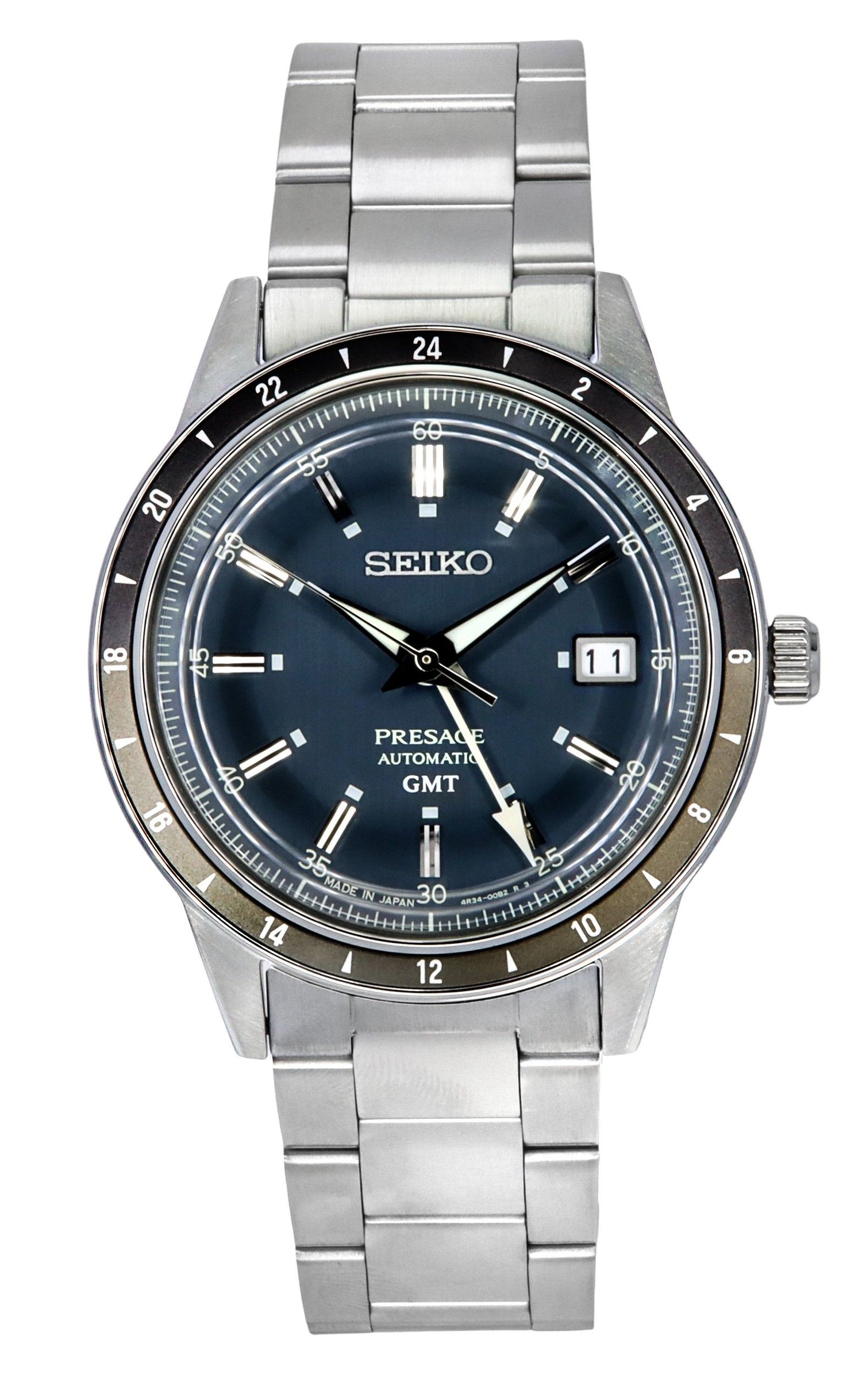 Seiko Presage Style60's GMT Stainless Steel Blue Dial. A brand-new Seiko Presage watch featuring a Blue dial and a Stainless steel strap. Angled view.