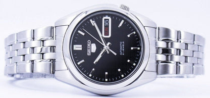 Seiko Automatic movement Black Stainless steel Male SNK361K1. A brand-new Seiko watch featuring a Black dial and a Stainless steel strap. Angled view. - view 5