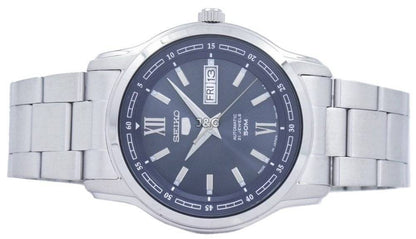 Seiko Automatic movement Black Stainless steel Male SNKP17J1. A brand-new Seiko watch featuring a Black dial and a Stainless steel strap. Angled view. - view 5