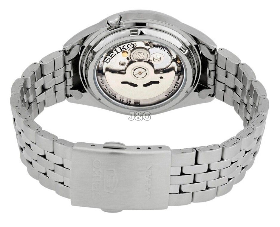 Seiko Automatic movement Blue Stainless steel Male SNKL23J1. A brand-new Seiko watch featuring a Blue dial and a Stainless steel strap. Side view. - view 3