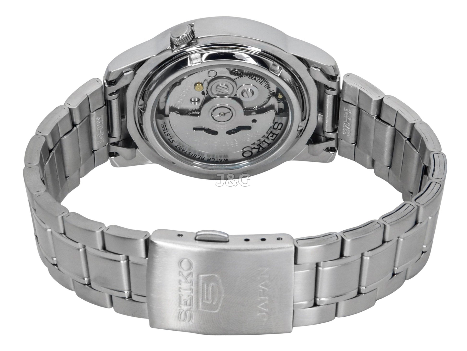 Seiko Automatic movement White Stainless steel Male SNKE51J1. A brand-new Seiko watch featuring a White dial and a Stainless steel strap. Side view. - view 4