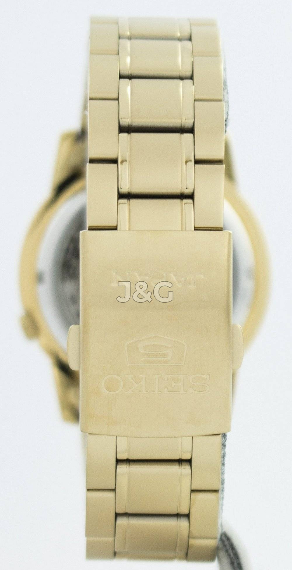 Seiko Automatic movement White Stainless steel Male SNKK38J1. A brand-new Seiko watch featuring a White dial and a Stainless steel strap. Side view. - view 4