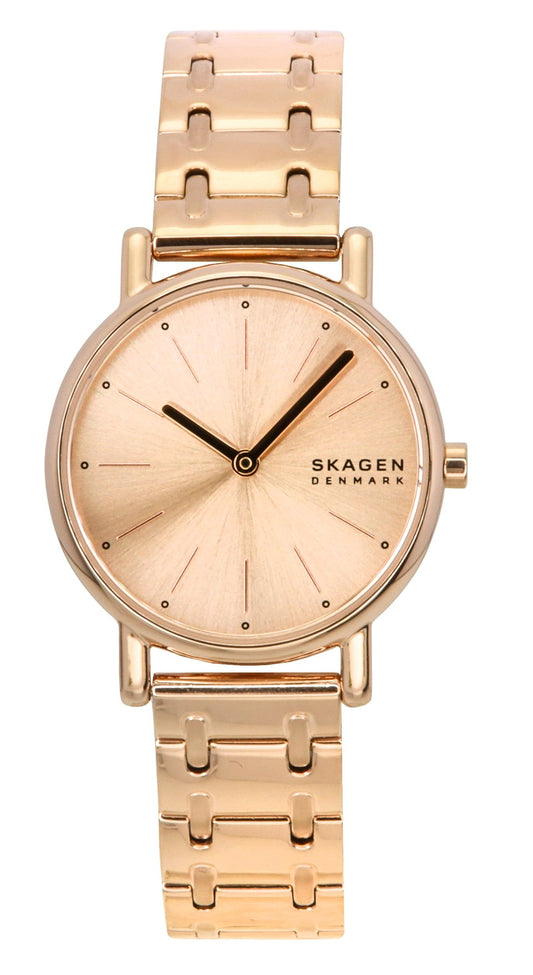 Skagen Signatur Lille Rose Gold Tone Stainless Steel Rose. A brand-new Skagen Signatur watch featuring a Gold dial and a Stainless steel strap. Angled view.